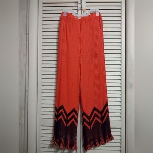 The Sang Pleated Flare Leg Pant